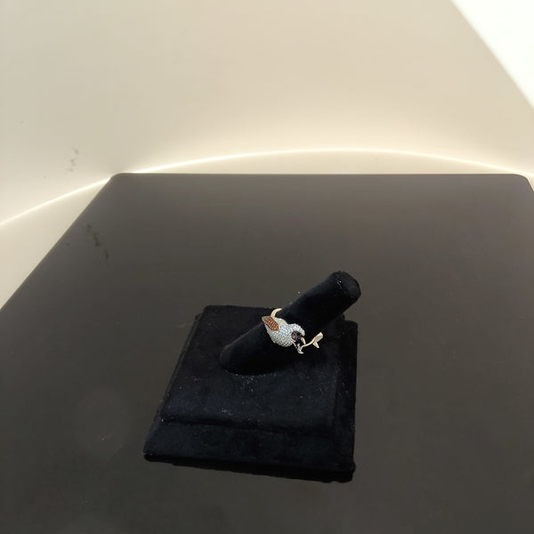 Little bird in silver ring