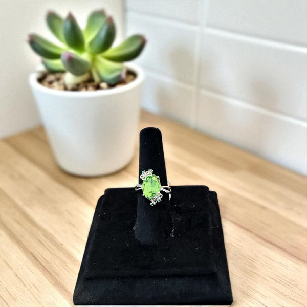 Silver ring with green stone