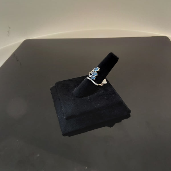 Silver ring with three blue stone