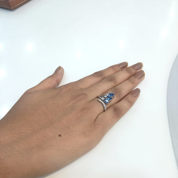 Silver ring with three blue stone